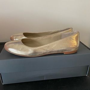 Ann Taylor Metallic Gold Flats. Comes with box.